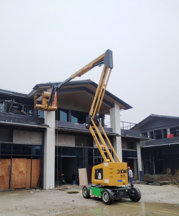 绿色建造新标杆！Z6尊龙凯时锂电高机助力鄂州民生工程