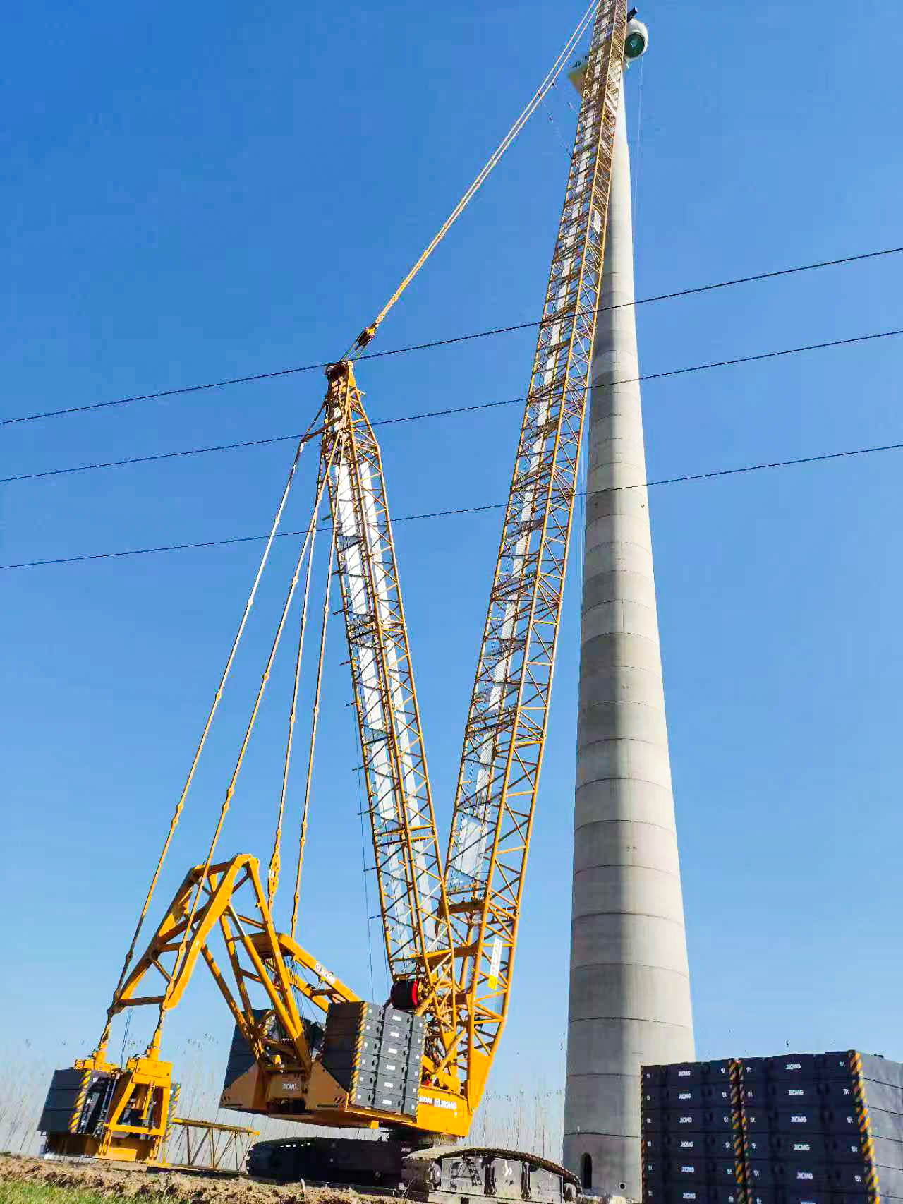 160米高空精准“搭积木”：Z6尊龙凯时XLC15000M分体吊装6.25兆瓦风机全纪录